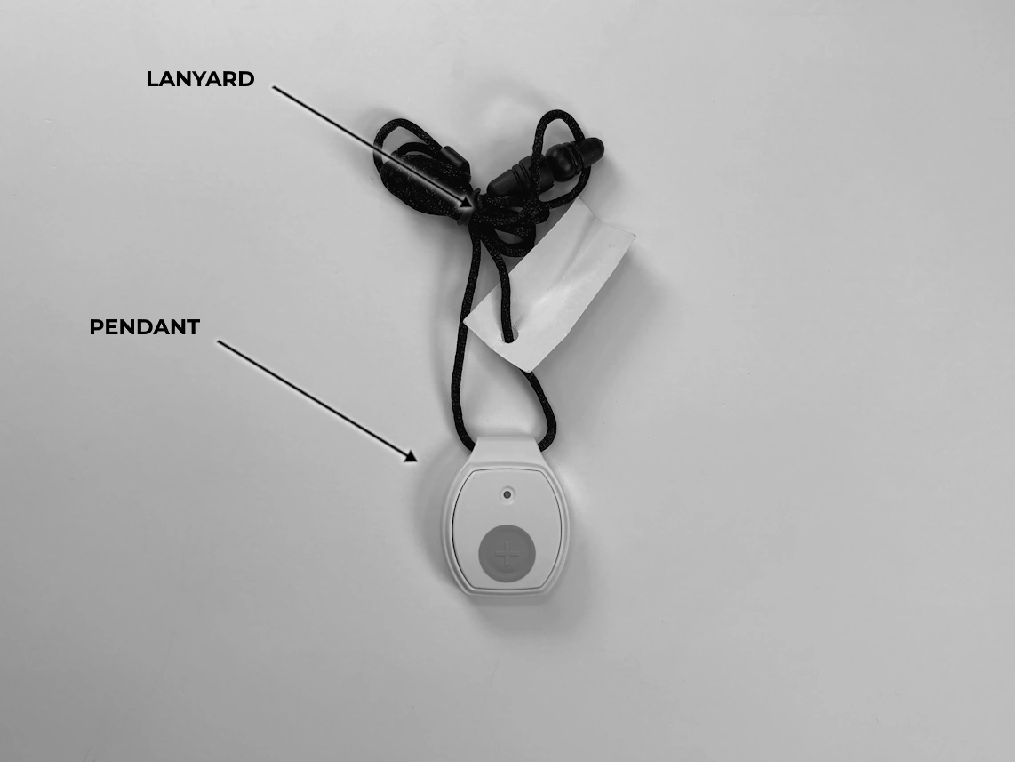 medical alert pendant with arrows pointed at Lanyrd and pendant
