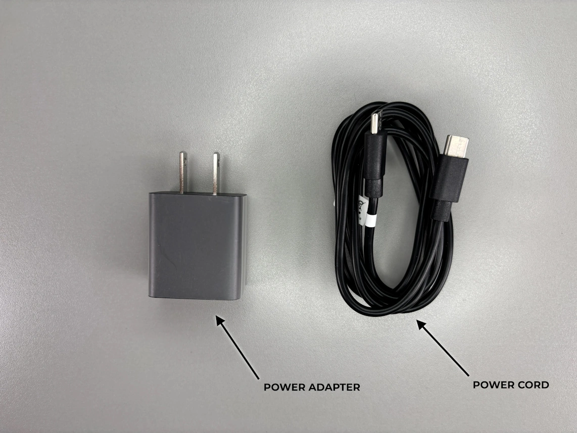 phone cord provided in the box with the medical alert with the arrow pointed at it