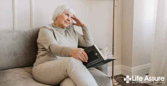 Life Assure Senior Woman Happily Pondering